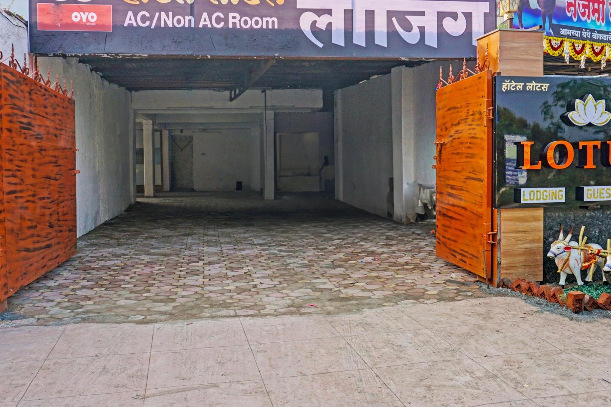 Oyo 820503 Lotus Lodge And Guest House Kharakvasla Exterior photo